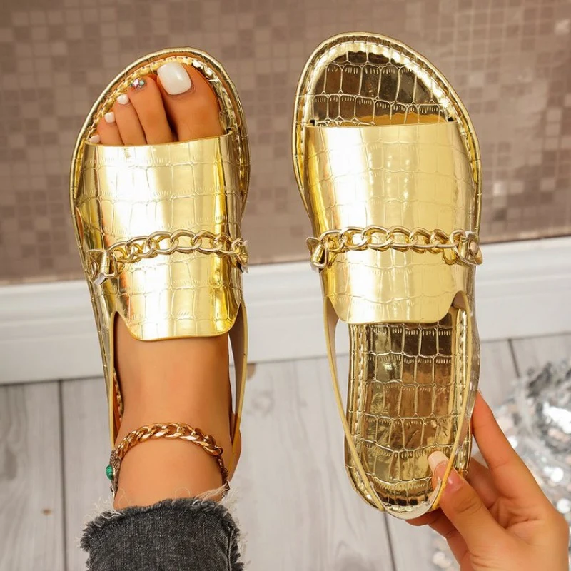 Damesslippers in goudkleurige glitter, platte slides